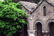 A small church amidst the many buildings in downtown Athens